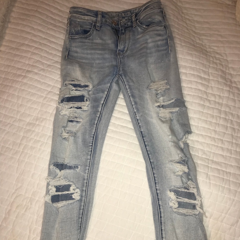 Light wash distressed jeans